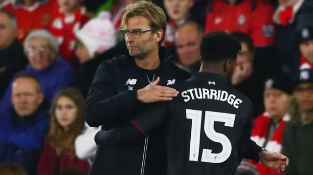 Daniel Sturridge and Jurgen Klopp