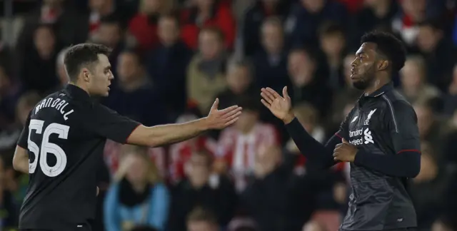 Connor Randall and Daniel Sturridge celebrate for Liverpool