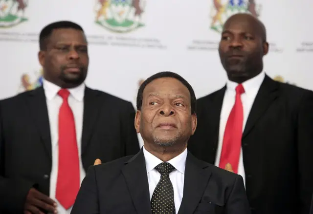 Zulu King Goodwill Zwelithini (C) looks on prior to deliver a speech during a traditional gathering called Imbizo at the Moses Mabhida Football Stadium in Durban on April 20, 2015.