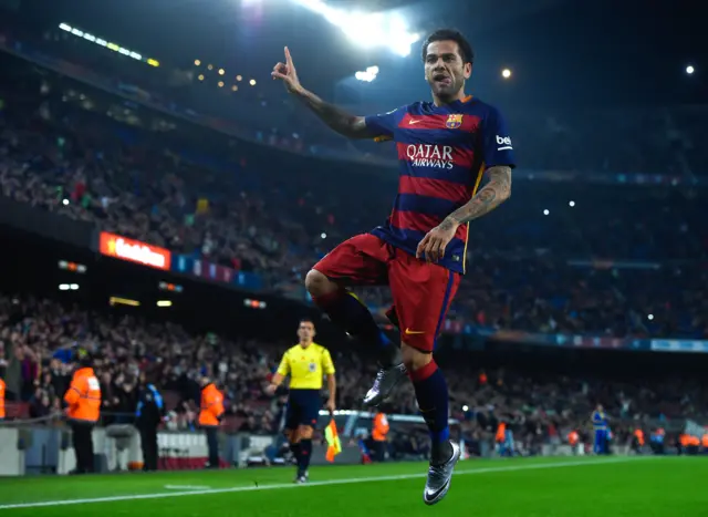 Dani Alves celebrates his goal for Barcelona