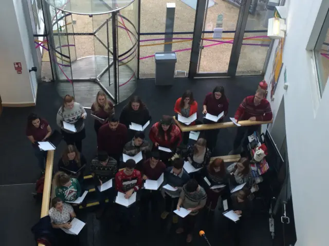 Carol singers in reception