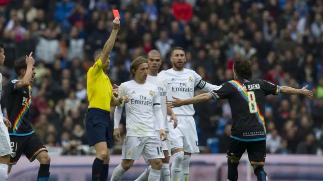 Jose Raul Baena is shown a red card