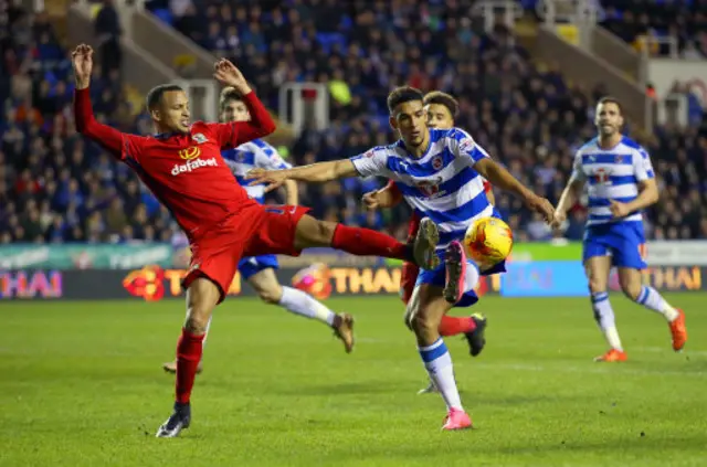 Blackburn Rovers Markus Olsson and Reading's Nick Blackman battle for the ball