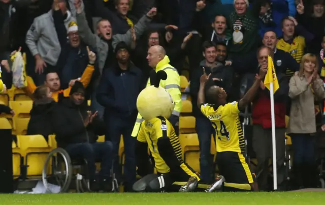 Odion Ighalo celebrates his second goal and Watford's third