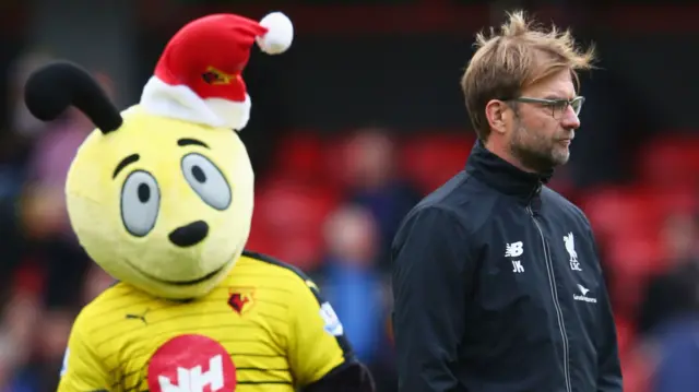 Liverpool manager Jurgen Klopp with the Watford mascot