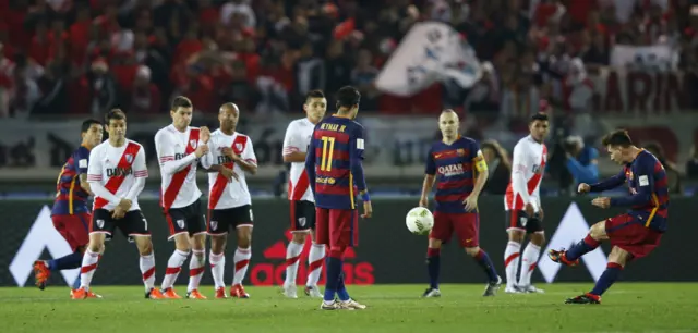 Lionel Messi takes a free-kick