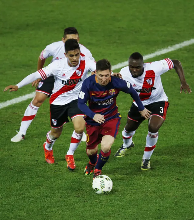 Lionel Messi runs with the ball