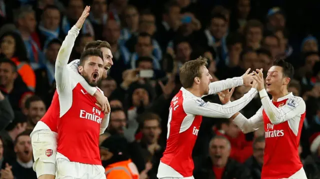 Olivier Giroud celebrates Arsenal's second