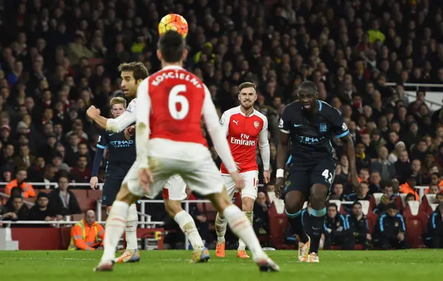 Yaya Toure draws one back for Man City against Arsenal