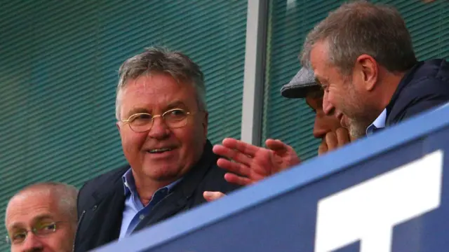 Guus Hiddink (left)