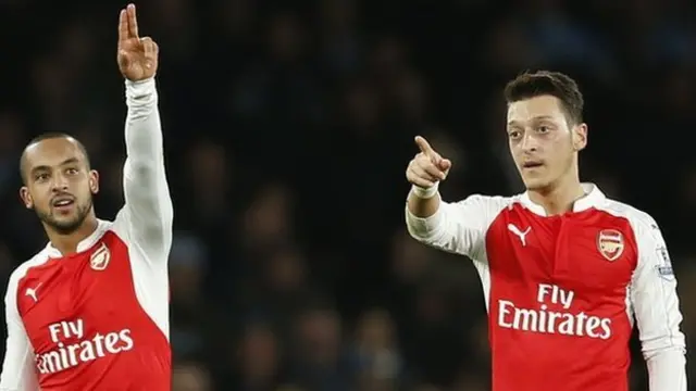 Mesut Ozil and Theo Walcott