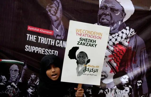 Indian Shia Muslims and members of the Anjuman-e- Imamia of Bangalore a non-governmental organisations hold placards during a protest rally in Bangalore, India on 18 December 2015