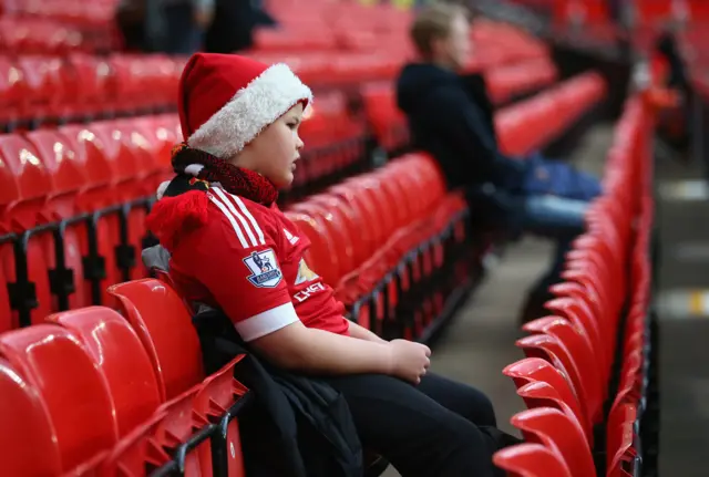 Sad Manchester United Santa kid