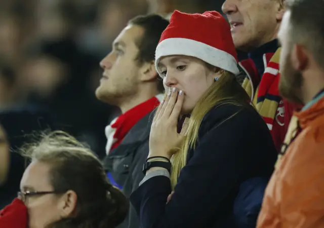 Arsenal fans look dejected