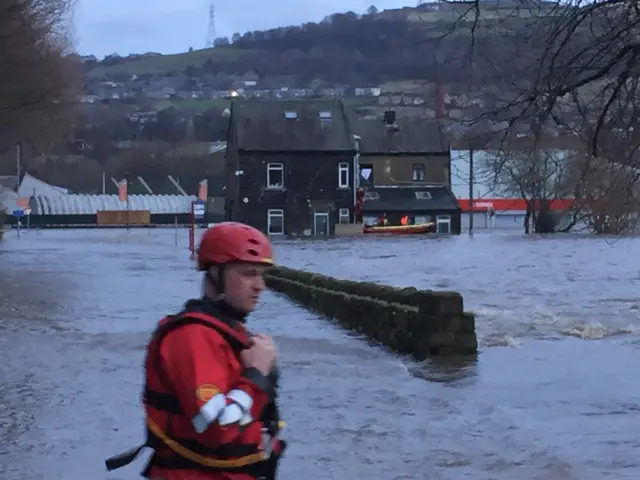 Rescuer in Shipley flood