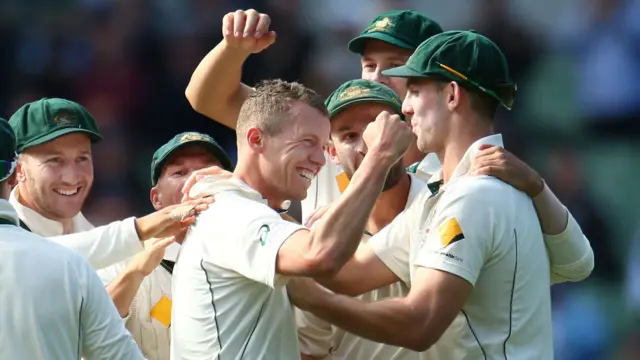 Australia celebrate a wicket for Peter Siddle