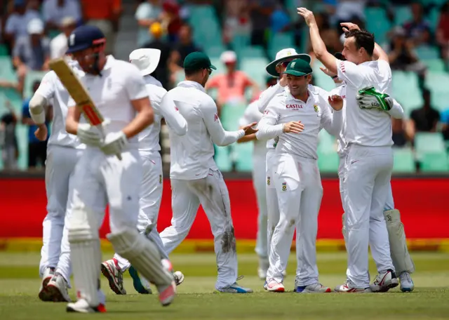 Kyle Abbott of South Africa celebrates taking the wicket of Jonny Bairstow