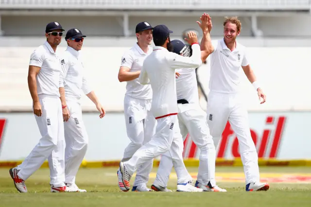 Stuart Broad of England is congratulated after Hashim Amla of South Africa was caught behind