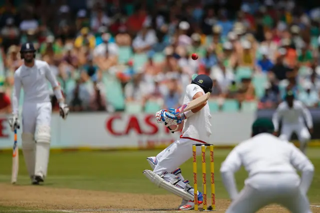 Stuart Broad tries to avoid the ball during day two