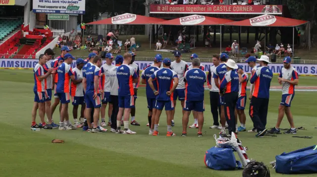 England huddle before the start of day two