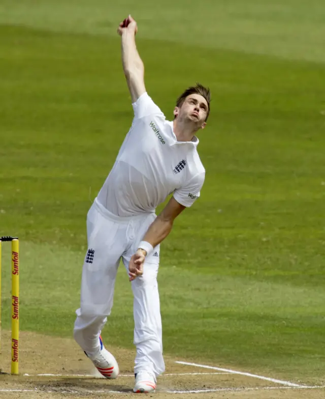 Chris Woakes bowls