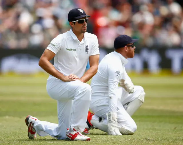 Alastair Cook and Johnny Bairstow look on after a dropped catch