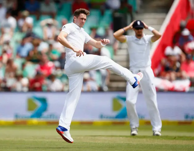 Chris Woakes of England reacts after a dropped catch