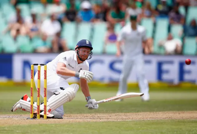 Jonny Bairstow of England takes a hit to the head