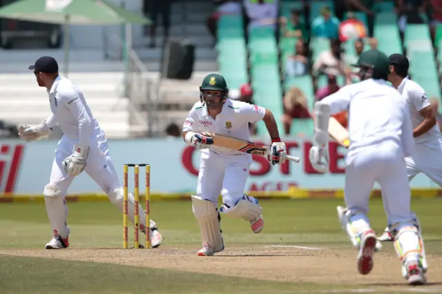 Dean Elgar runs with Dale Steyn