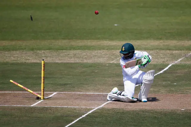 Temba Bavuma is bowled out by Stuart Broad