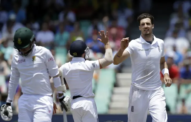 Steven Finn celebrates