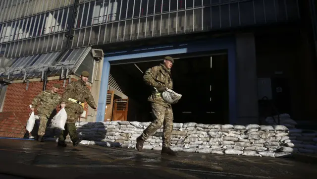 Soldiers with sandbags in York