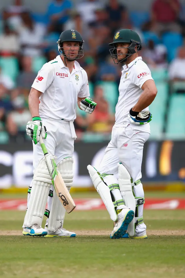 AB de Villiers stands with Faf du Plessis