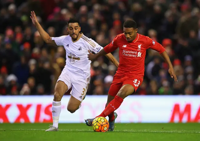 Neil Taylor and Jordon Ibe