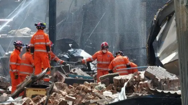 Rescuers at site of Bosley blast