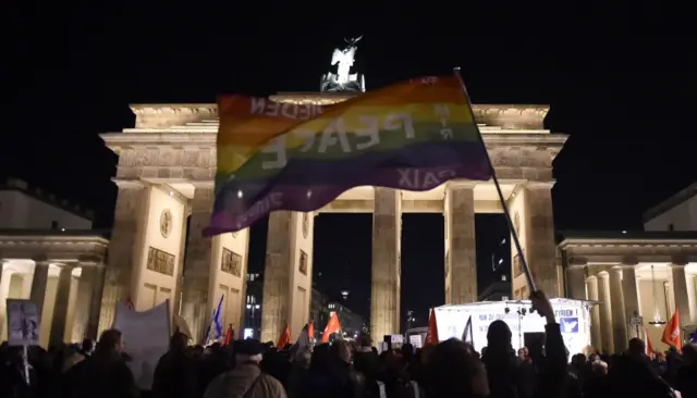 Protesters at the Brandenburg Gate in Berlin