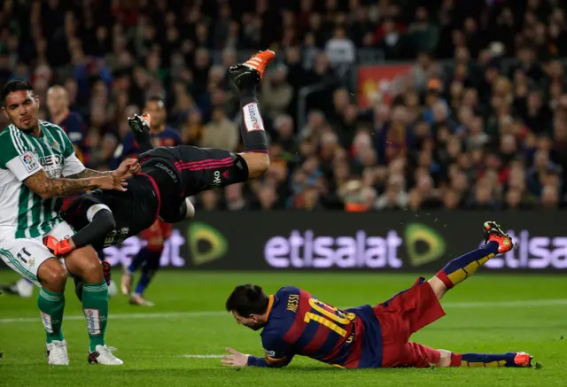 Lionel Messi goes down