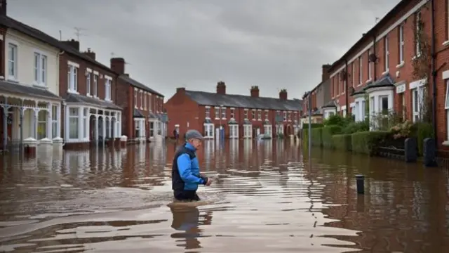 Carlisle resident in floodwaters