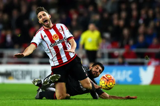 Emre Can commits a foul