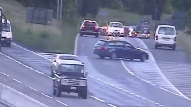 Cars reversing down the M1