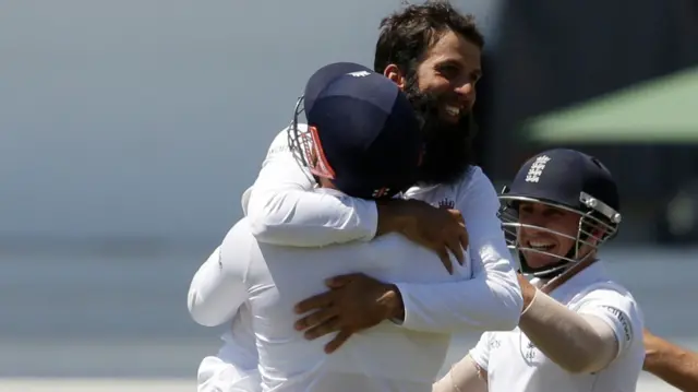 Moeen Ali celebrates with Jonny Bairstow