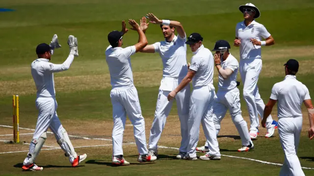 Steven Finn celebrates