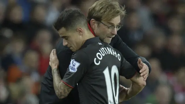 Philippe Coutinho embaces Jurgen Klopp