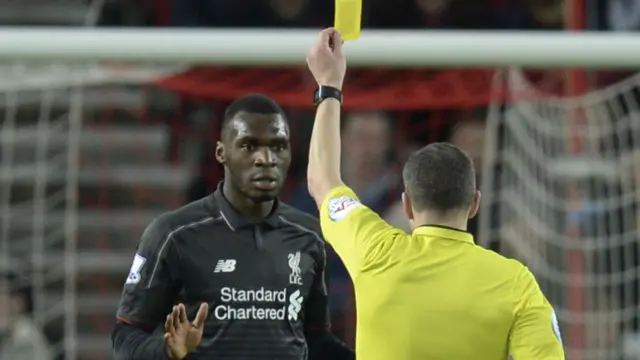 Christian Benteke is booked