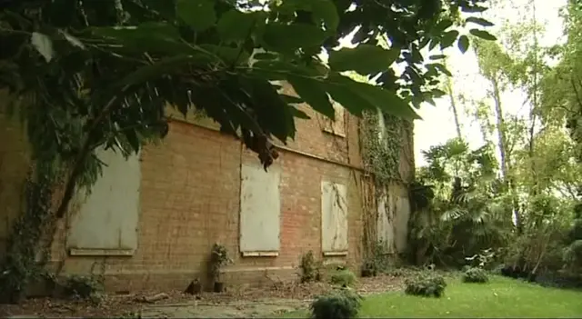 Exterior shot of Mr Martin's isolated farmhouse