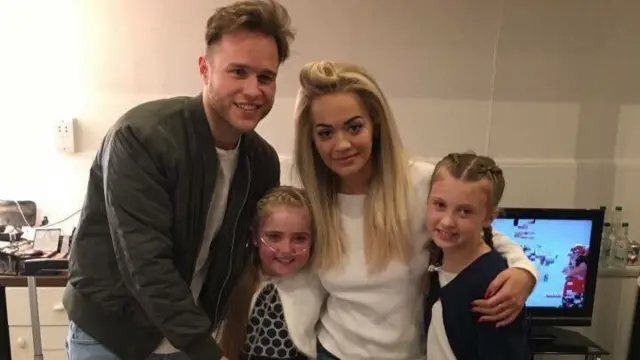 Elle (middle) and her sister Cara with Olly Murs and Rita Ora