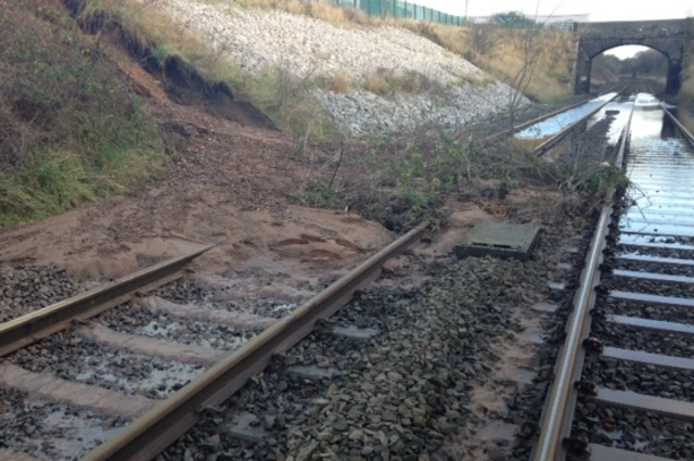 Flooded tracks and landslip near Aspatria