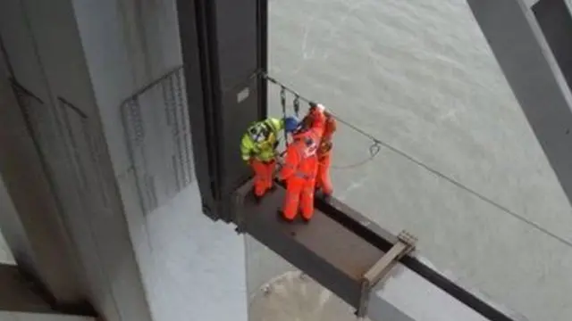 Engineers inspecting Forth road Bridge