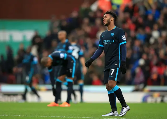 Manchester City winger Raheem Sterling looks dejected