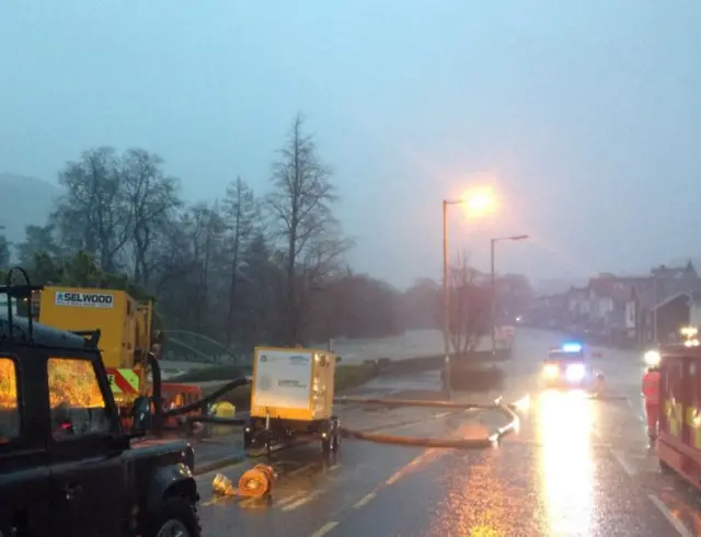 Emergency services pump water in Keswick